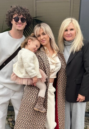 Lisa Burningham with her children and grandchild.